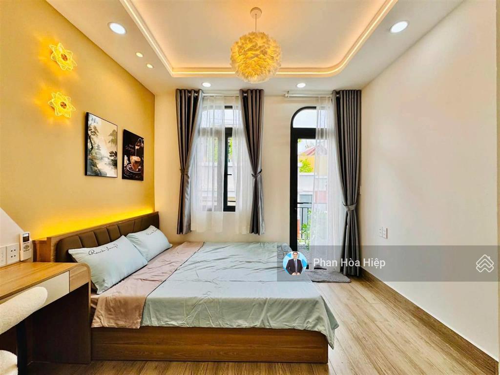 Nhà ngang 7m ngay lê quang sung, 3 tầng, 4pn có phòng trệt, hẻm xe hơi gần trường chi lăng