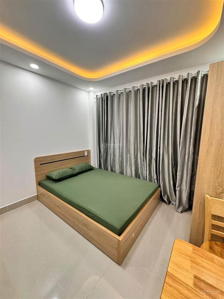 Khai trương tòa chdv mới xây full nội thất cửa sổ ban công lớn ngay cống quỳnh bùi viện q1.