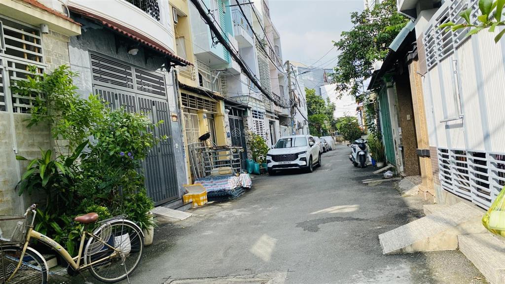 Nhà 1 trệt 1 lầu 5x13m nở hậu 5,9m 63,5m² ngay chợ an nhơn. tiện sửa bán, xây chdv
