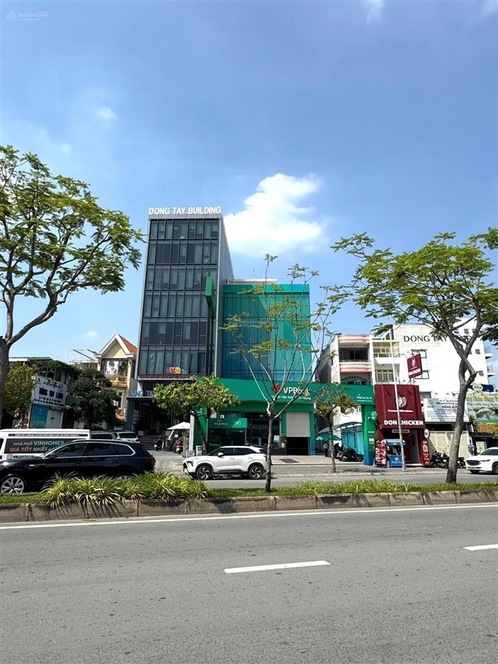 Tòa nhà mặt tiền trần não  q2 dt 10m x 40m  hđt 420tr/tháng  165 tỷ  hầm 7 tầng