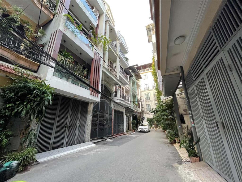 Bán nhà phố tôn thất tùnglê trọng tấn, 131m2, 6t, mt 5.4m, 2 ô tô tránh, thang máy, qh ổn định