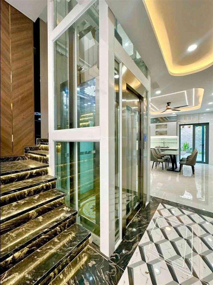 Nhà đẹp lê đình cẩn  thang máy  5 tầng  (4x19m) 4pn  hxh 8m  gần tỉnh lộ 10  chỉ 8.6 tỷ