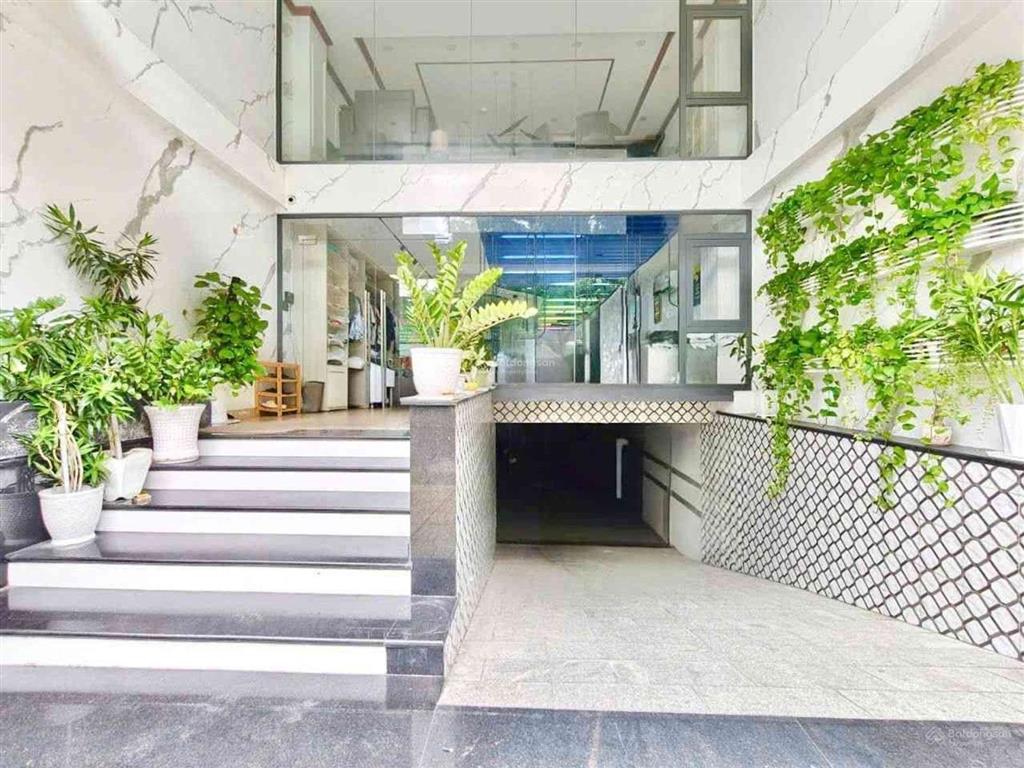 Tân phú  mtkd đường lê niệm  7 tầng thang máy (6.1x19m)  7pn  dòng tiền 50tr/th  giá 23 tỷ