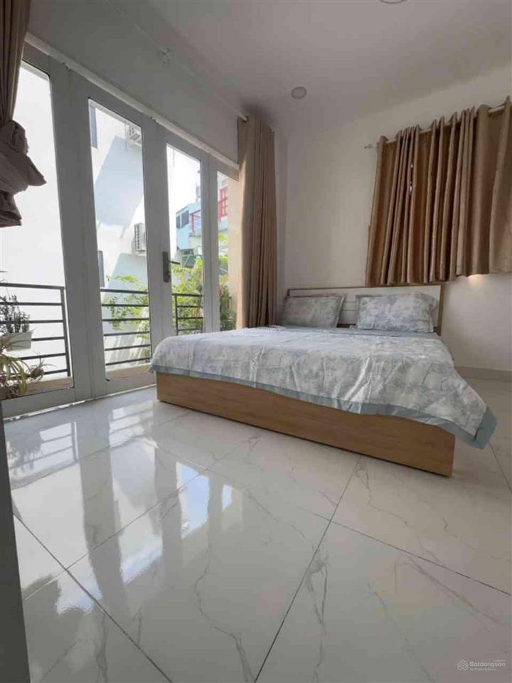 4,7 tỷ nhà bán. lê quang định, bình thạnh. 28 m2  3 tầng btct  3 pn, sân thượng. nở hậu. ngang 4