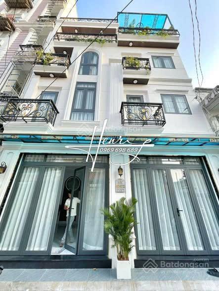 Bán nhà 4 tầng mt hẻm 6m ô tô ngủ trong nhà q7 42m² giá chỉ 9x tỷ