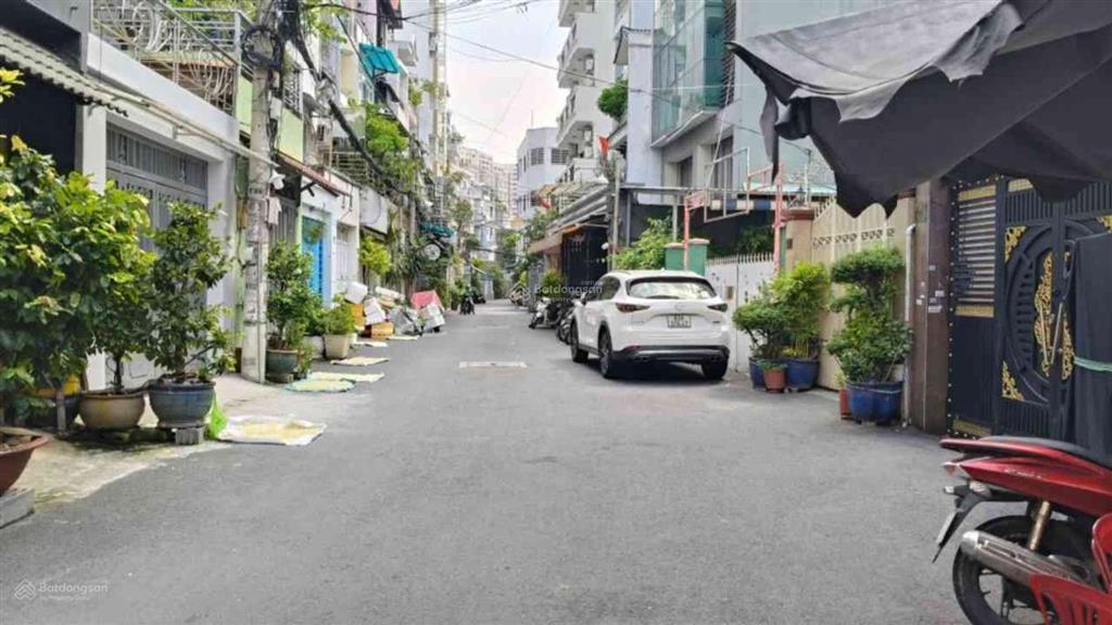 Sát tô hiến thành 127m2 cao 7 tầng btct mới đẹp có thang máy  12 phòng  thuê 100tr/ tháng