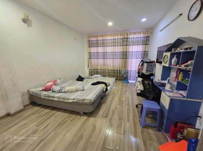 Bán nhà ngay dh công thương lê trọng tấn. dt 4x12m, 1 lầu, hẻm xe hơi thông. giá 6 tỷ 9 tl