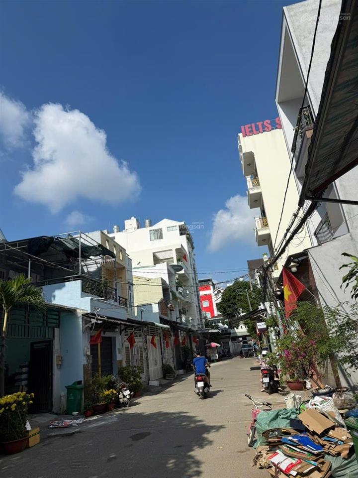 Cho thuê nhà sát kênh tham lương lê trọng tấn  dt 10x20m 1 lầu. giá 33 triệu