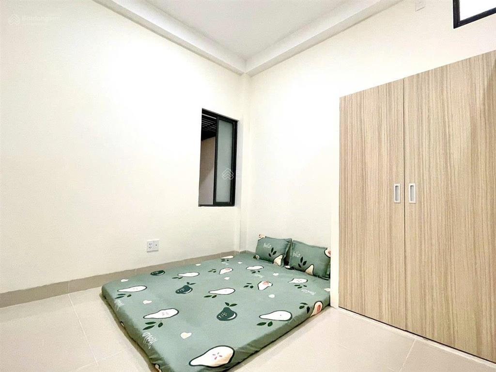 Bán gấp chdv siêu ngon hẻm xe hơi bùi đình túy xây mới funl nt 13 phòng dòng tiền 700tr/năm 12.8tỷ
