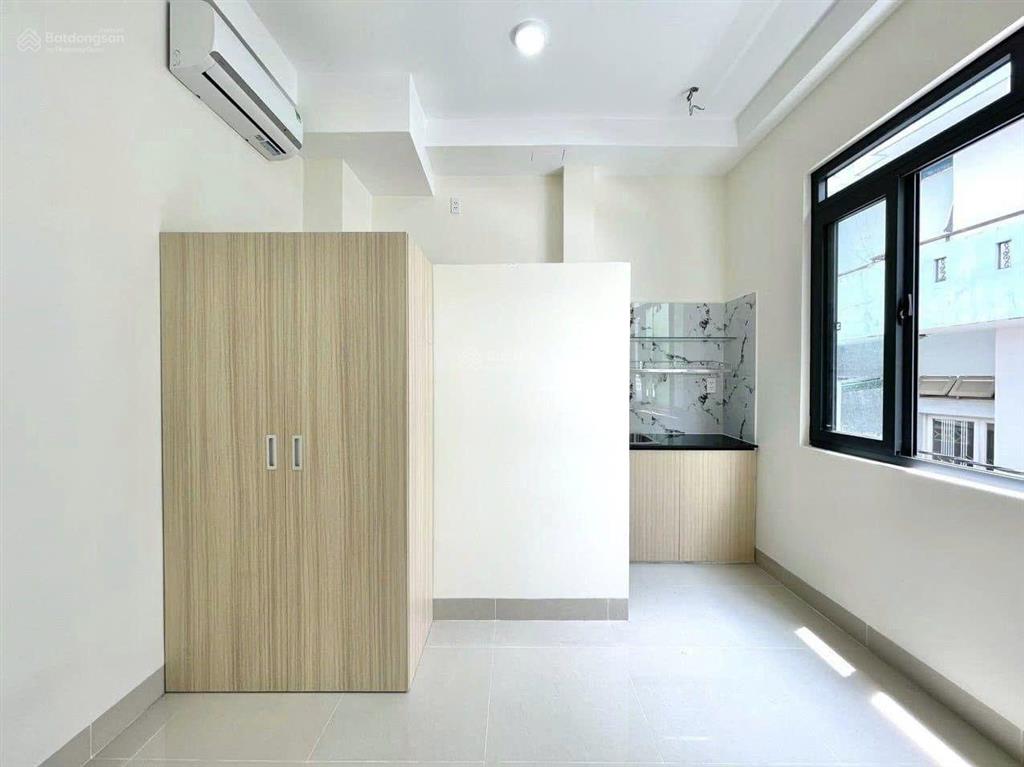 Bán gấp chdv siêu ngon hẻm xe hơi bùi đình túy xây mới funl nt 13 phòng dòng tiền 700tr/năm 12.8tỷ