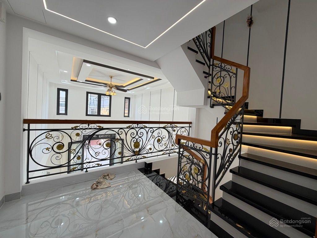 Nhà xây mới lê quang định  giáp bình thạnh  5pn khép kín  đường 10m  chỉ 10.3 tỷ 4 tầng