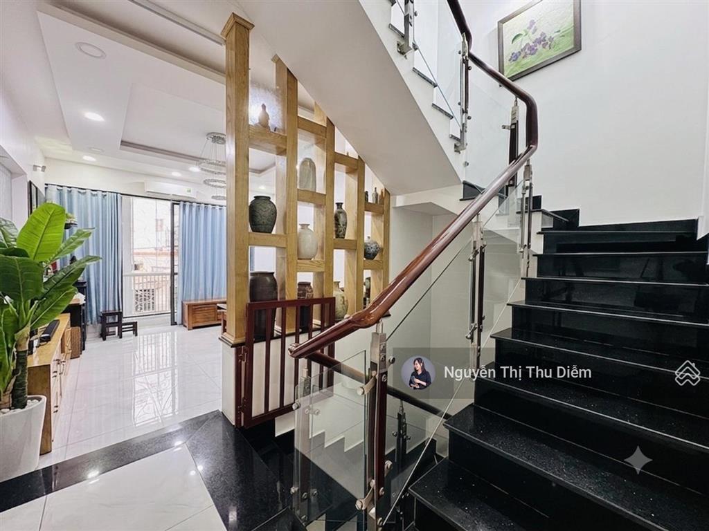 Ô tô 7 chỗ vào nhà  lê quang định 70m2 (4.2m x 16m)  nở hậu 7m  4 tầng btct  có pn tầng trệt