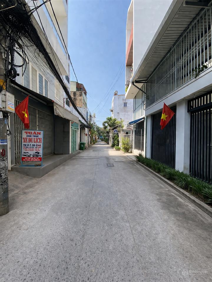 Chdv 5 tầng  20 phòng, dt 960tr/năm  bùi văn ba. 130m2, ngang 6.5m, xe hơi đổ cửa  giá 17 tỷ hơn
