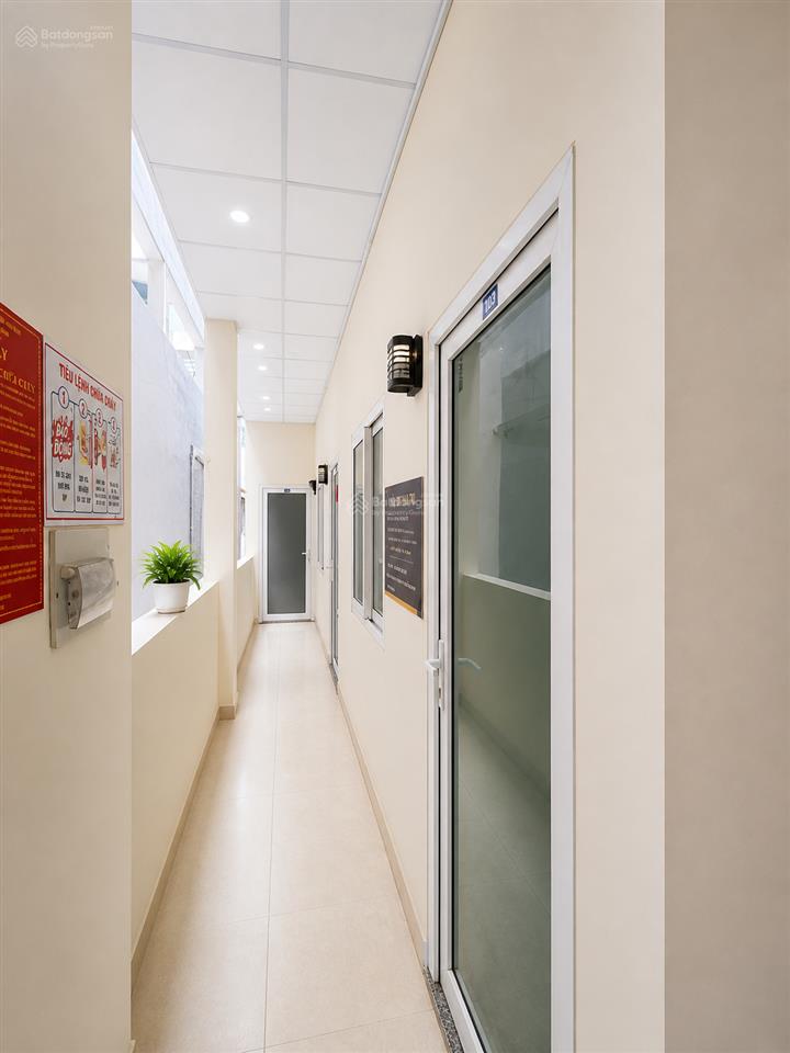 Chdv 5 tầng  20 phòng, dt 960tr/năm  bùi văn ba. 130m2, ngang 6.5m, xe hơi đổ cửa  giá 17 tỷ hơn