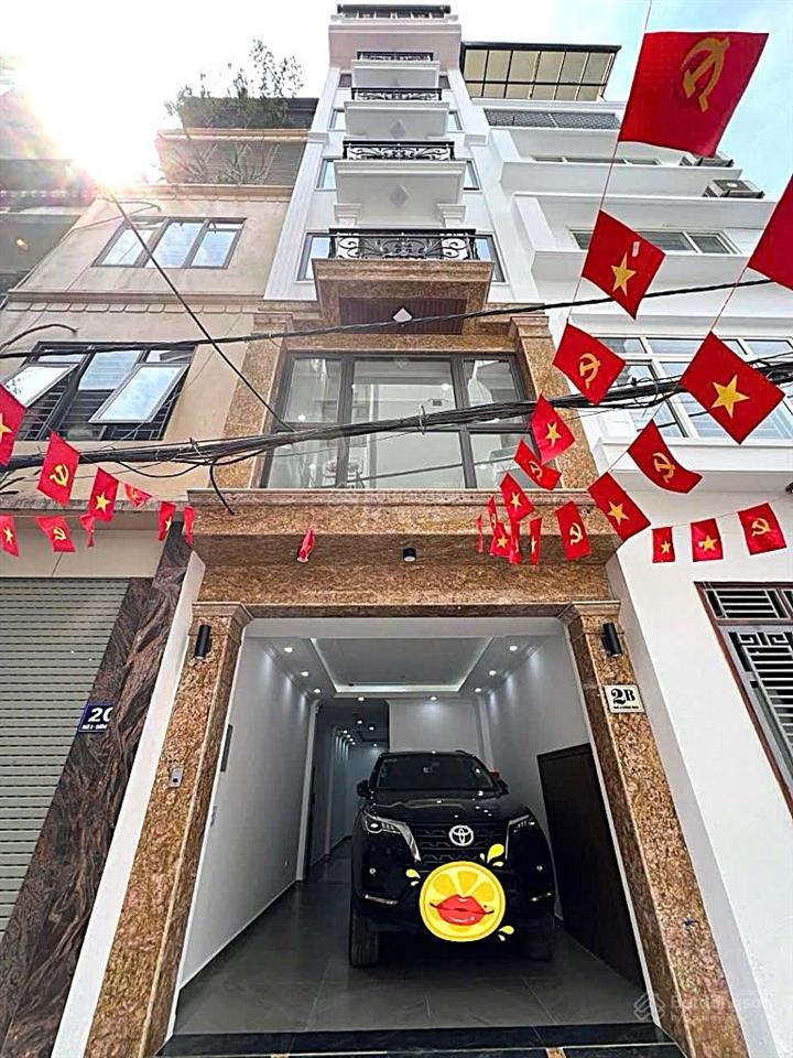 Bán nhà hồ tùng mậu 45m  8t  gara  ngõ thông kd  vài mét ra phố  giá cực êm