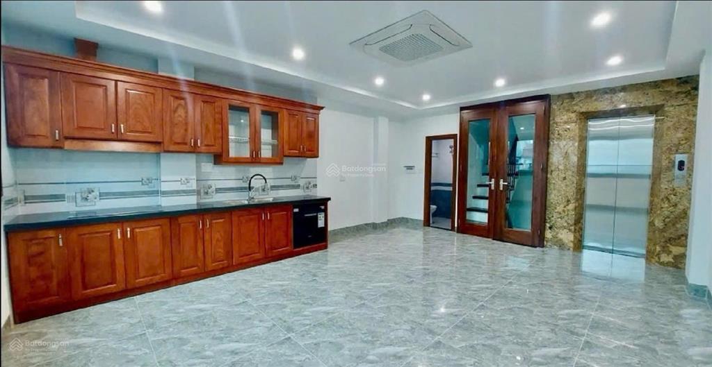 Bán nhà hồ tùng mậu 45m  8t  gara  ngõ thông kd  vài mét ra phố  giá cực êm