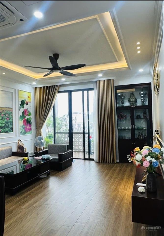 Bán nhà hồ tùng mậu 45m  8t  gara  ngõ thông kd  vài mét ra phố  giá cực êm