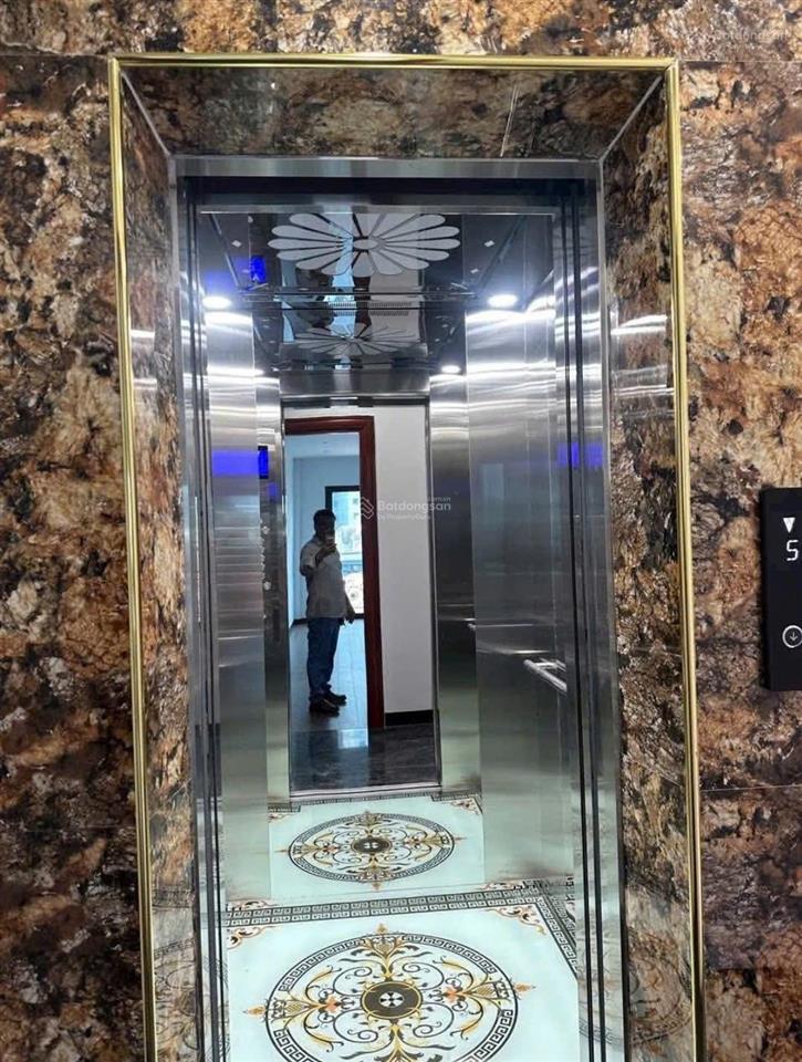 Bán nhà hồ tùng mậu 45m  8t  gara  ngõ thông kd  vài mét ra phố  giá cực êm