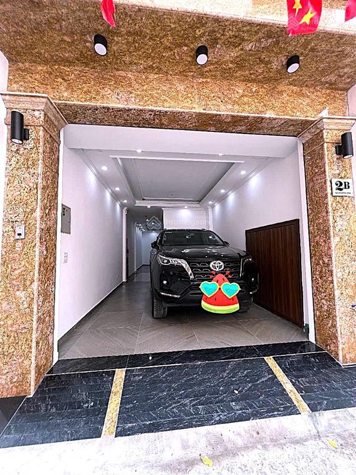 Bán nhà hồ tùng mậu 45m  8t  gara  ngõ thông kd  vài mét ra phố  giá cực êm