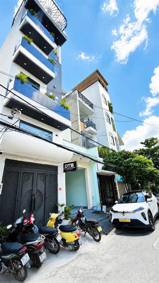 Nhà đẹp 4 tầng + thang máy. hẻm 8m thông 1/ tmt2a giá 8,89 tỷ