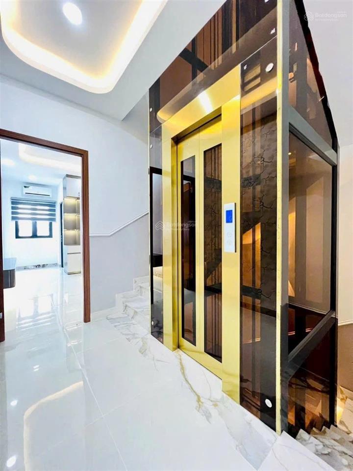 Nhà đẹp 4 tầng + thang máy. hẻm 8m thông 1/ tmt2a giá 8,89 tỷ