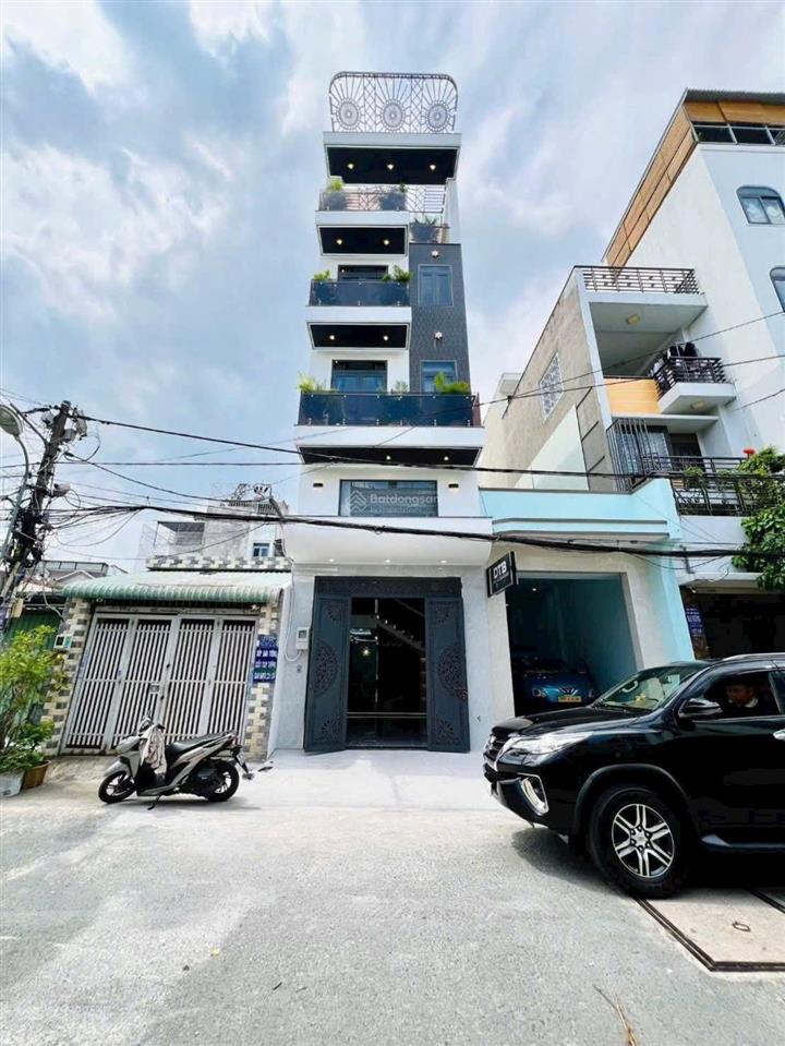 Nhà đẹp 4 tầng + thang máy. hẻm 8m thông 1/ tmt2a giá 8,89 tỷ