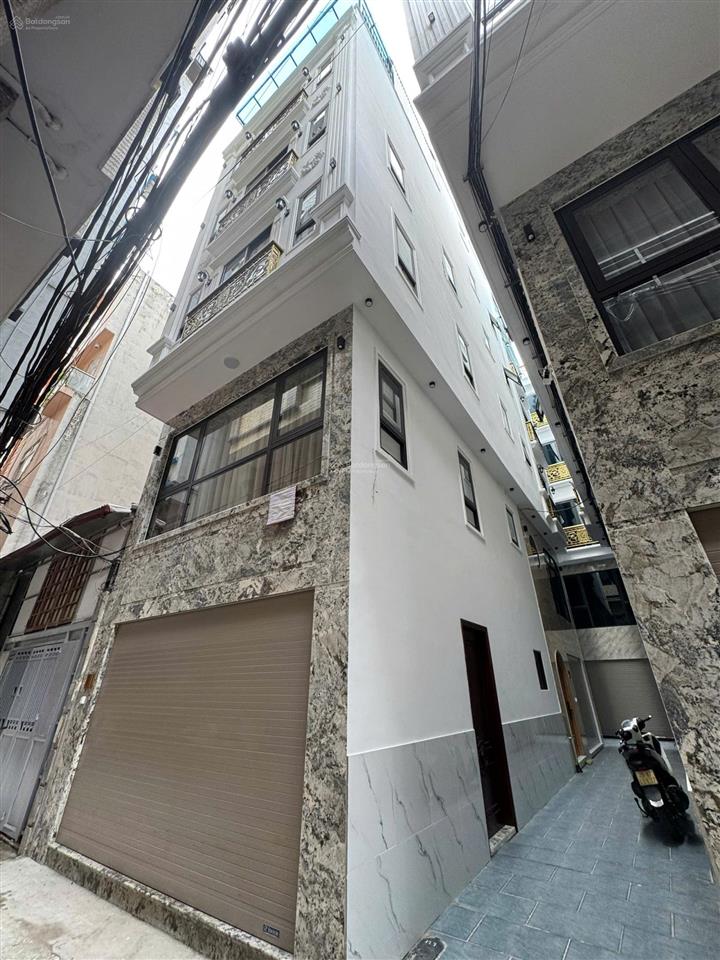 Nhà lô góc trần duy hưng, cầu giấy. dt 52m2* 6 tầng* mt khủng. thang máy  nt cao cấp  oto vào nhà