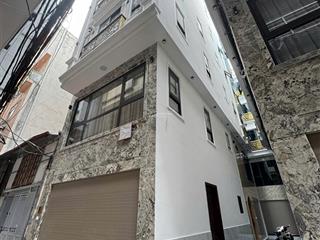 Nhà lô góc trần duy hưng, cầu giấy. dt 52m2* 6 tầng* mt khủng. thang máy  nt cao cấp  oto vào nhà