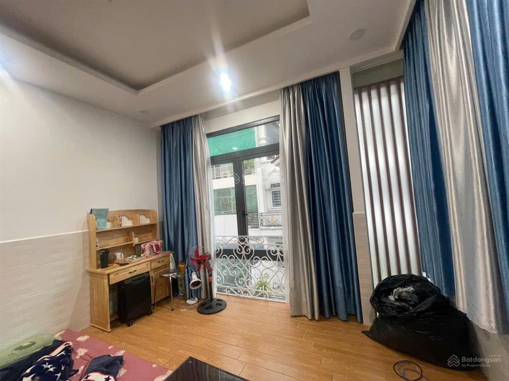 Cho thuê nhà ngang 6,5, thang máy, căn góc, nội thất cao cấp, quang trung, 25tr
