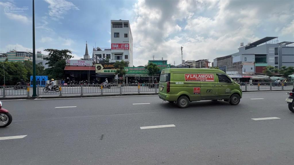 Ngộp bank! bán gấp nhà mt dương quảng hàm, p.5, gv. dt 170m2 (6,5x27m) hầm + 7 tầng  giá 25 tỷ