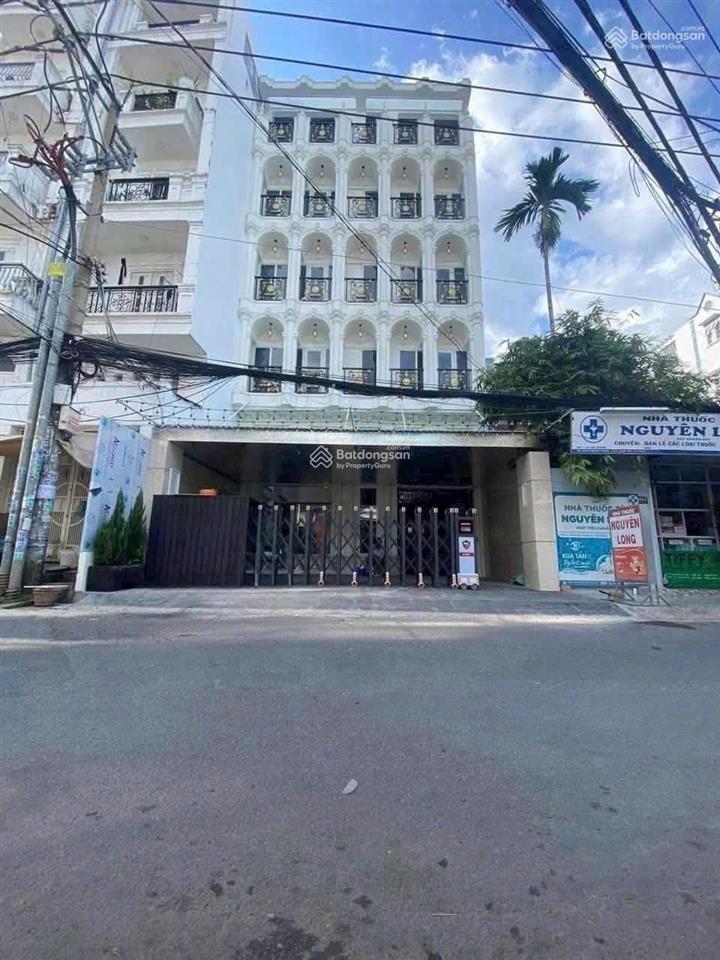 Ngộp bank! bán gấp nhà mt dương quảng hàm, p.5, gv. dt 170m2 (6,5x27m) hầm + 7 tầng  giá 25 tỷ