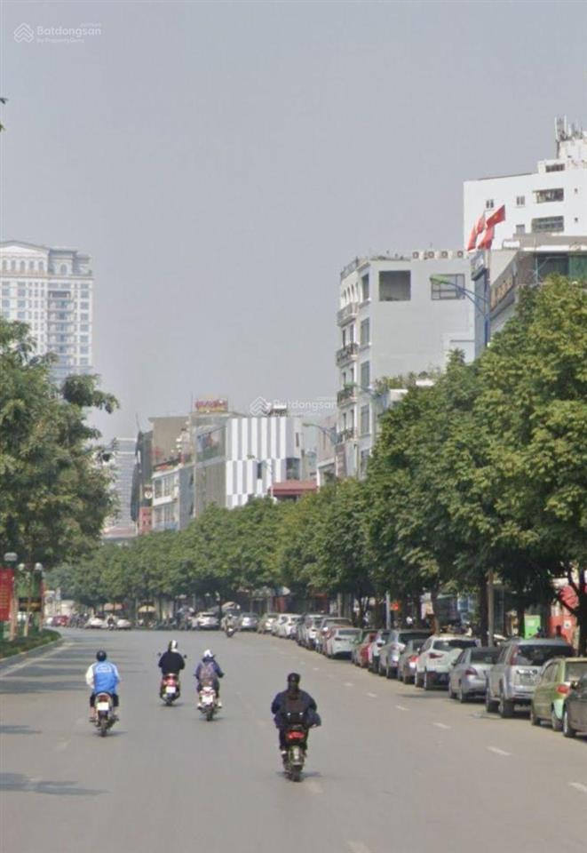 Bán tòa văn phòng mặt đường nguyễn văn huyên 2 mặt đường, 400m2 giá 400 tỷ, mặt tiền 12m