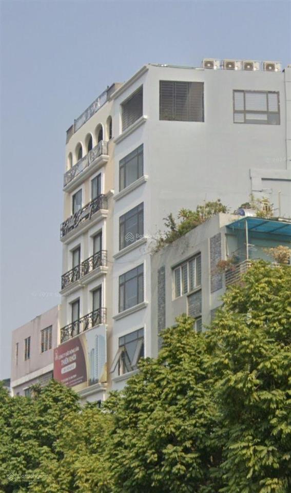 Bán tòa văn phòng mặt đường nguyễn văn huyên 2 mặt đường, 400m2 giá 400 tỷ, mặt tiền 12m