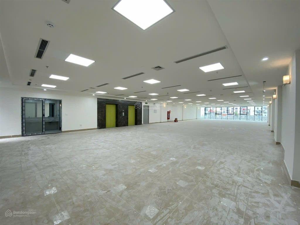 Bán tòa văn phòng mặt đường nguyễn văn huyên 2 mặt đường, 400m2 giá 400 tỷ, mặt tiền 12m