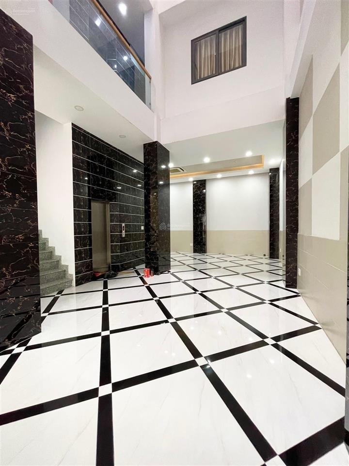 Toà nhà 514 lạc long quân 167m2 (8x21)m hầm 7 lầu  thang máy