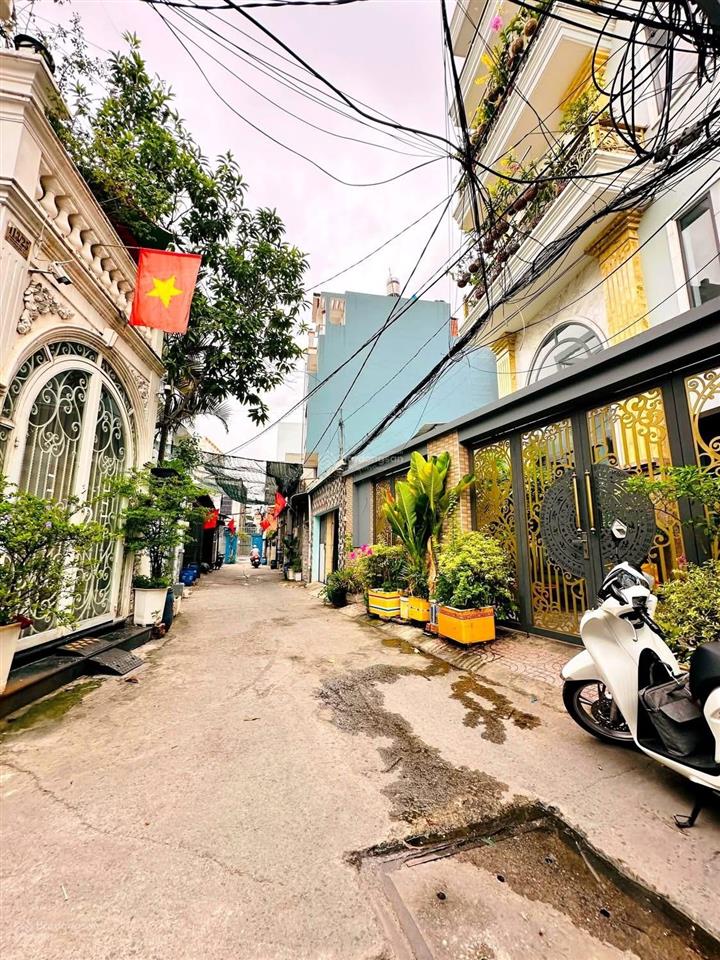 Nhà 2 tầng 46m2 ngay chợ đông bắc, cvpm quang trung, hẻm xe hơi đậu cửa.tân chánh hiệp, quận 12.