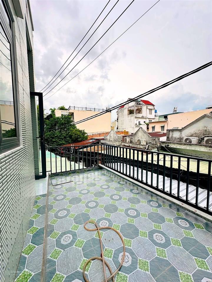 Nhà 2 tầng 46m2 ngay chợ đông bắc, cvpm quang trung, hẻm xe hơi đậu cửa.tân chánh hiệp, quận 12.