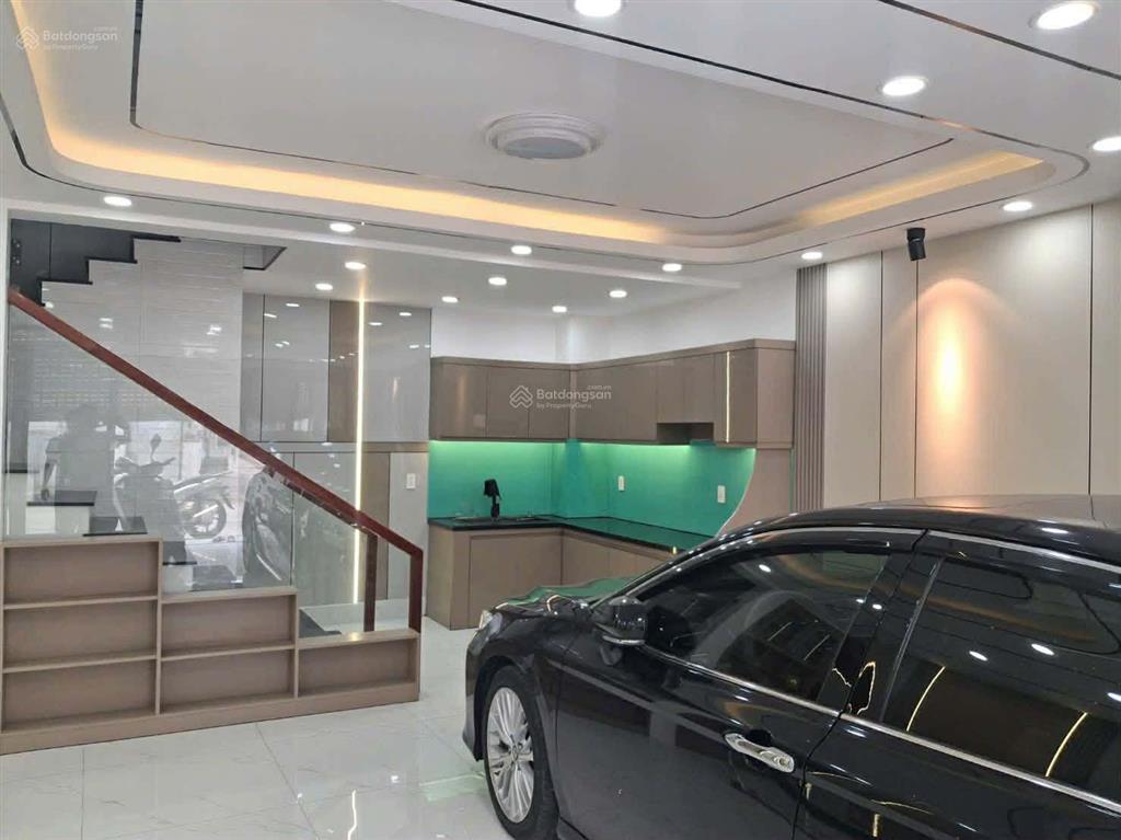 Bình tân.lê văn quới.5 tầng 60m 6pn. lớn 2 ô tô ngủ trong nhà. đường thông . giá 8 ty nhỷn