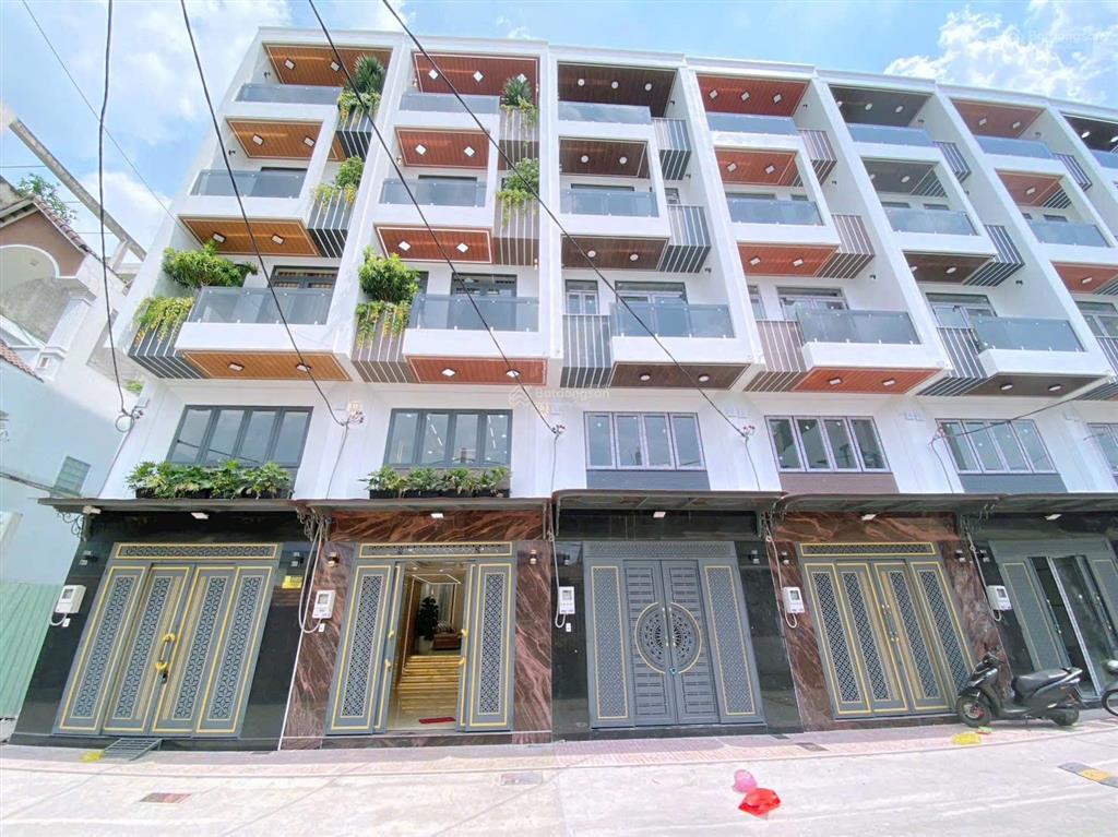 Bán nhà 1 trệt 4 lầu  lê trọng tấn  80m2  full nội thất  có thang máy 450kg chỉ 9ty850