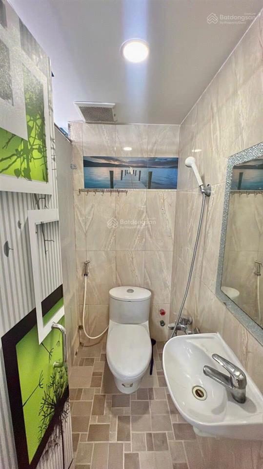 Bán nhà xây 1 trệt 4 lầu làm chdv đường lê trọng tấn  có 9 phòng  thu nhập 25tr  chỉ 6ty200