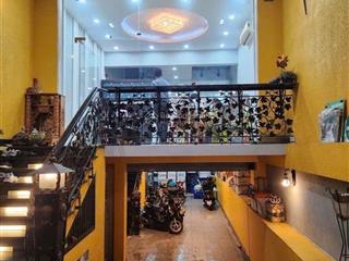 18t sát mặt tiền dương quảng hàm  5x20 5 tầng có hầm 4pn hẻm xe tải thông khu vực kd