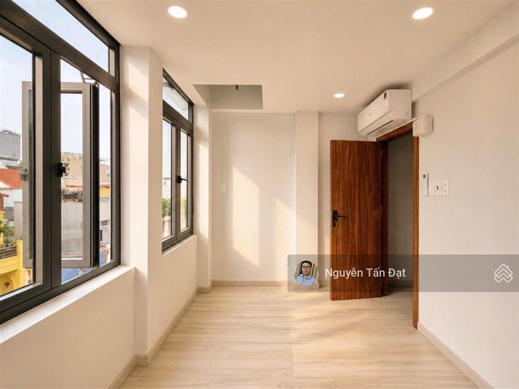 Mặt tiền 3,9m huỳnh văn bánh  5 tầng bê tông/8 phòng  kinh doanh đa ngành  11,1 tỷ