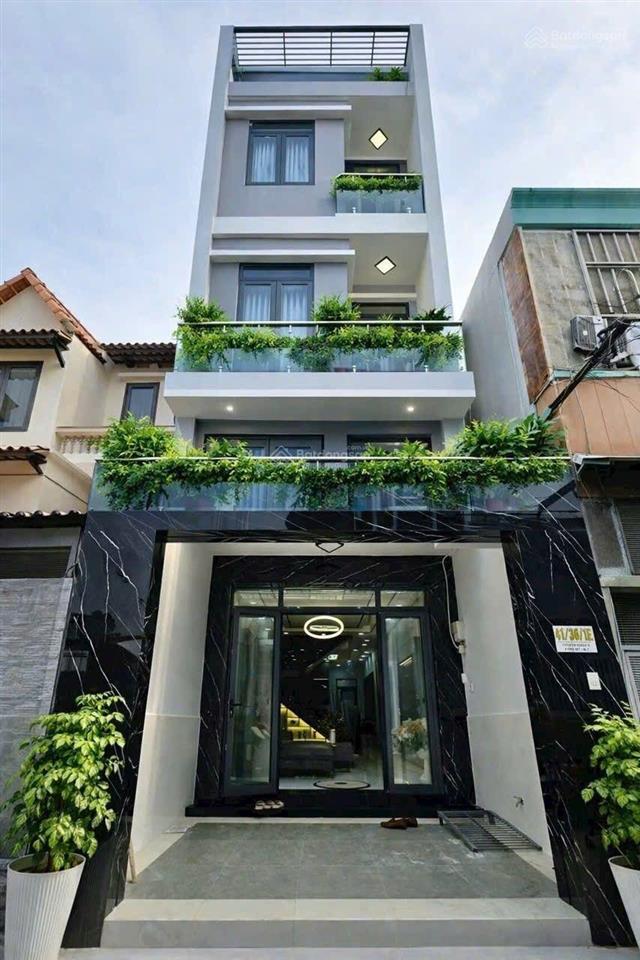 Bán căn nhà hẻm thông xe hơi quận 7