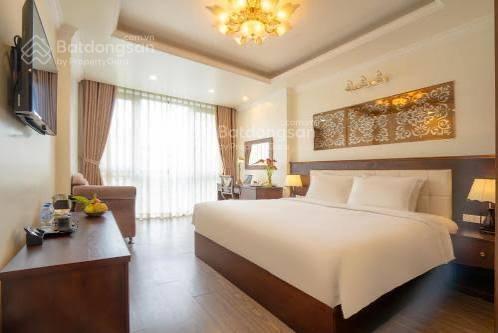 Cho thuê tòa khách sạn vip  25 phòng sát phố cổ  gần hồ gươm dt 130m2 x 9 tầng  mt 8m