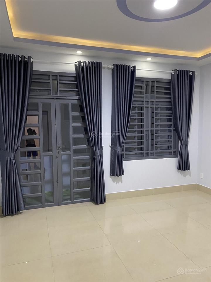 Bán nhà 1 lầu đúc đường hòa bình, p tân phú, tp hcm dt 4m65 x 11m50. sổ hồng riêng. giá 5.7 tỷ.