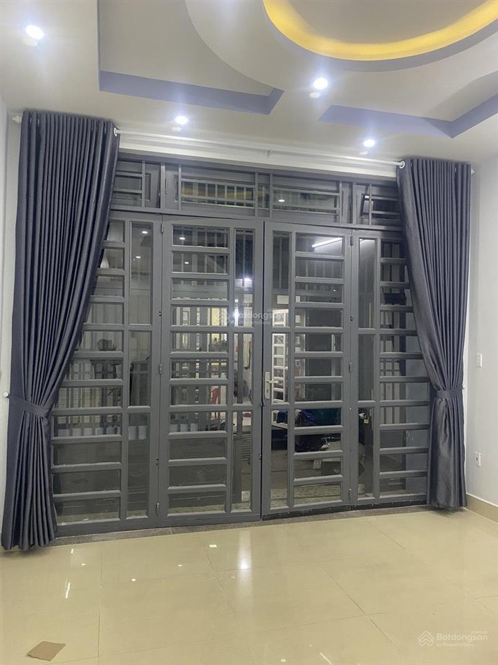 Bán nhà 1 lầu đúc đường hòa bình, p tân phú, tp hcm dt 4m65 x 11m50. sổ hồng riêng. giá 5.7 tỷ.