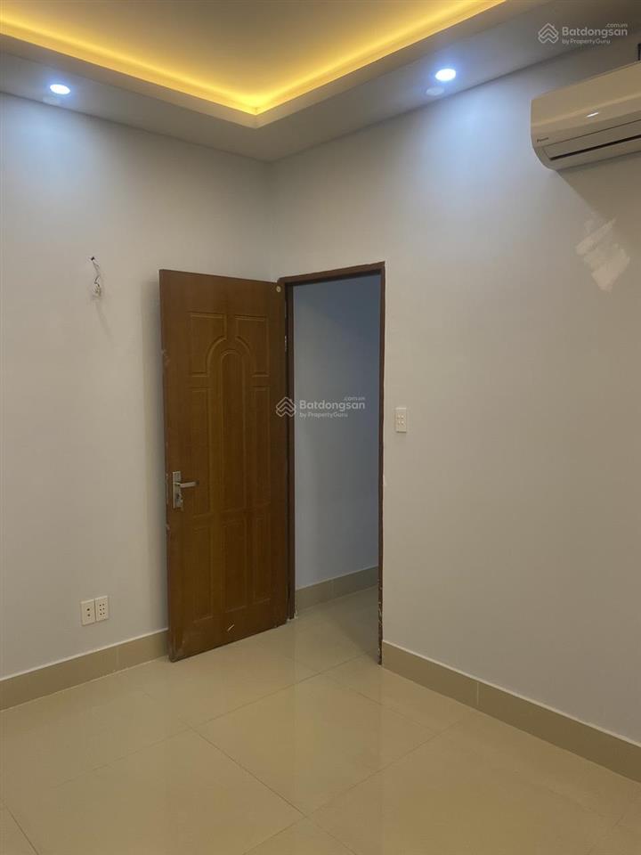 Bán nhà 1 lầu đúc đường hòa bình, p tân phú, tp hcm dt 4m65 x 11m50. sổ hồng riêng. giá 5.7 tỷ.