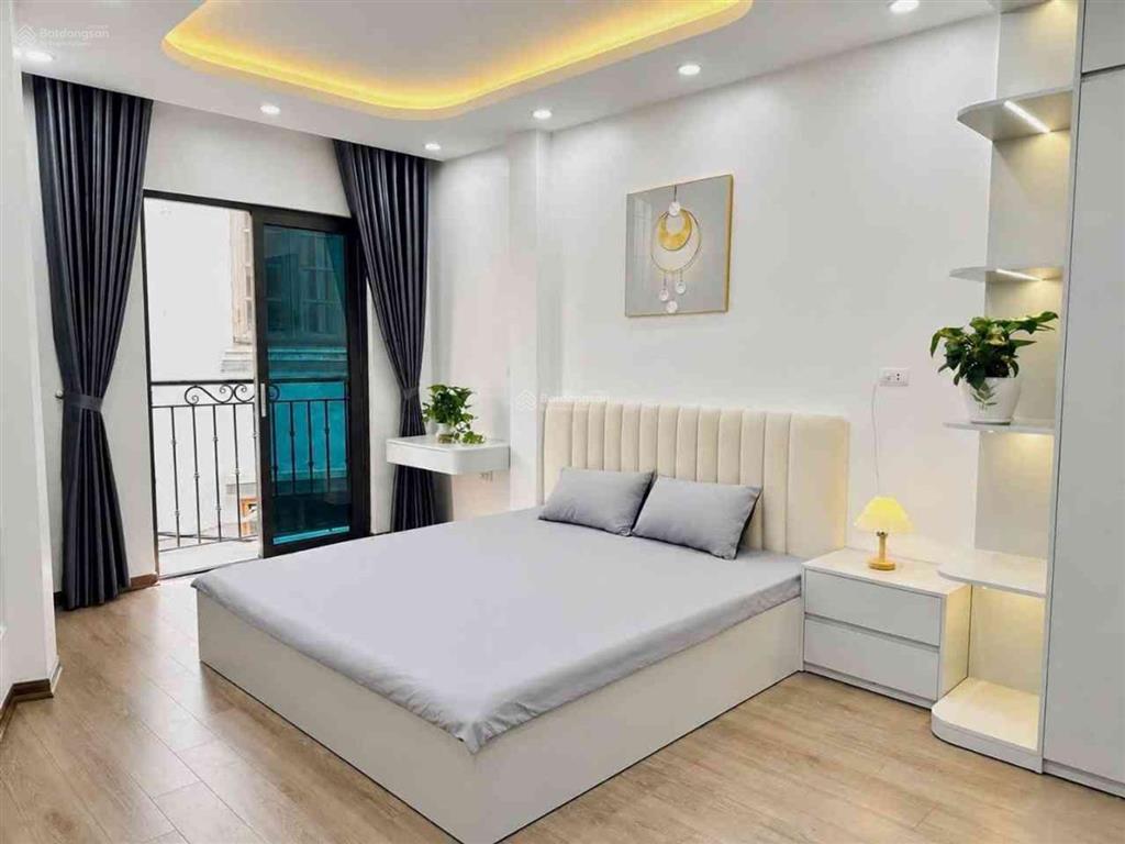 Bán nhà minh khai  hbt 40m2 *6 tầng thang máy, lô góc ngõ thông mới koong, giá 9,8 tỷ.