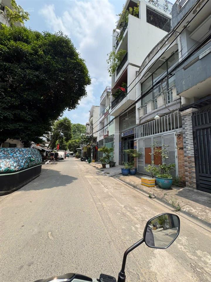 Đường nhựa 8m thông, cách chợ tân hương 200m, 6 tầng + thang máy 480kg, dt 5x20, giá 12,9 tỷ tl