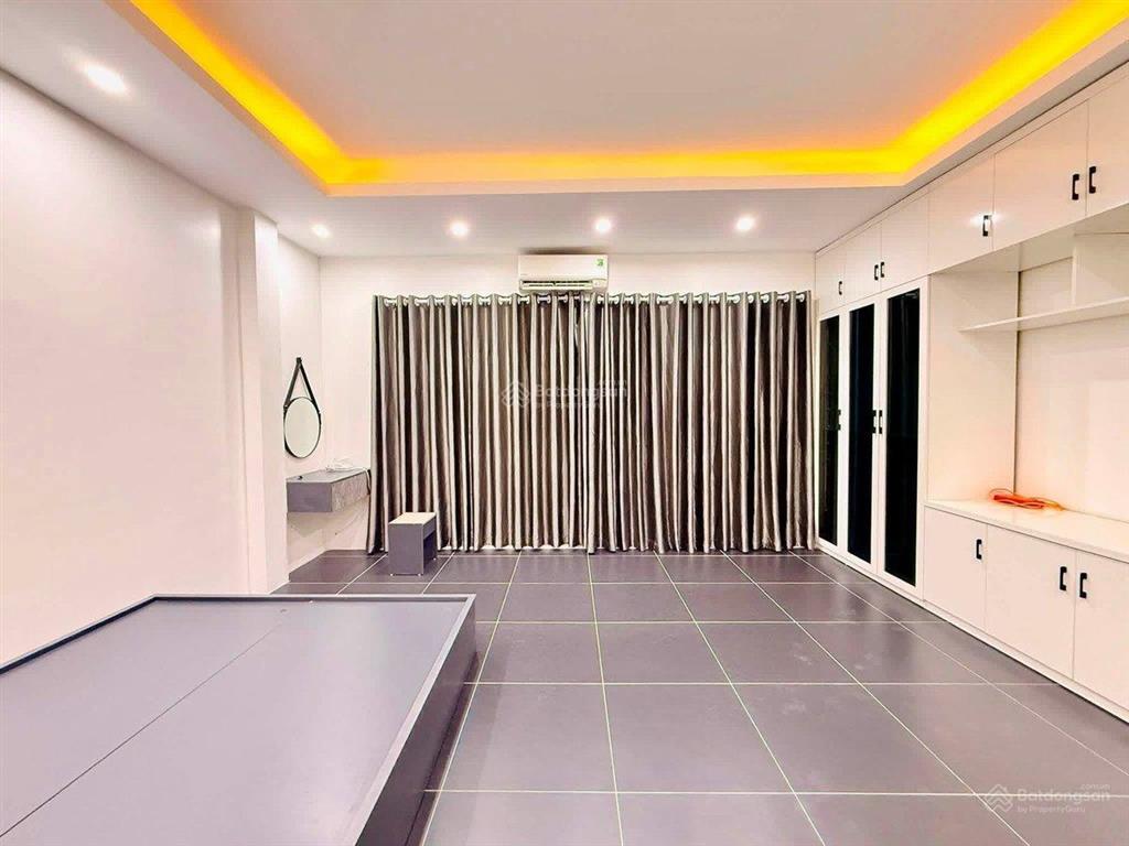 Bán nhà ngõ 8 lê quang đạo 31m2 * 6 tầng, 4 ngủ, ô tô đỗ cửa, mặt tiền rộng, nhà mới, full nội thất